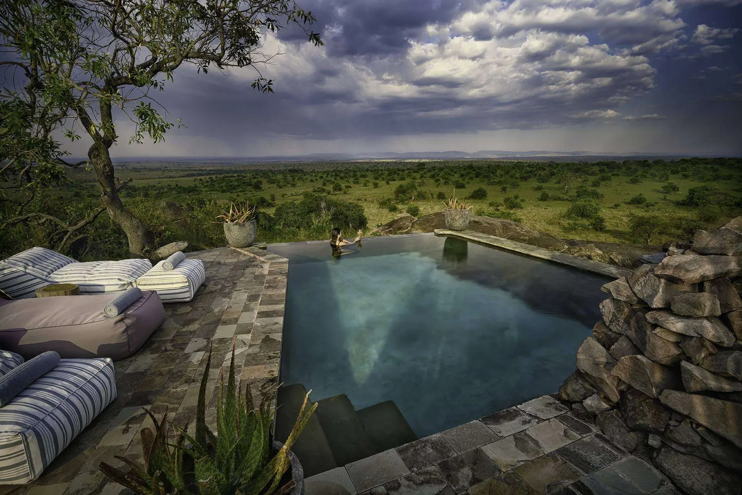 Nimali Mara pool overlooking the Serengeti landscape