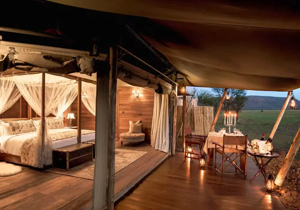 One Nature Nyaruswiga tented suite opening to the Serengeti